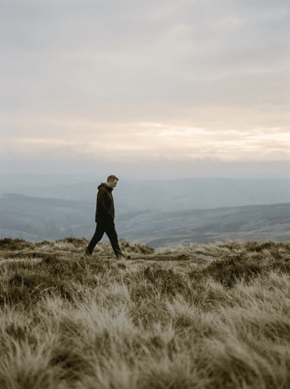 A person walking on a hillside